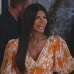 Teresa's orange floral print dress on The Real Housewives of New Jersey