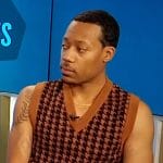 Tyler’s brown houndstooth vest on E! News