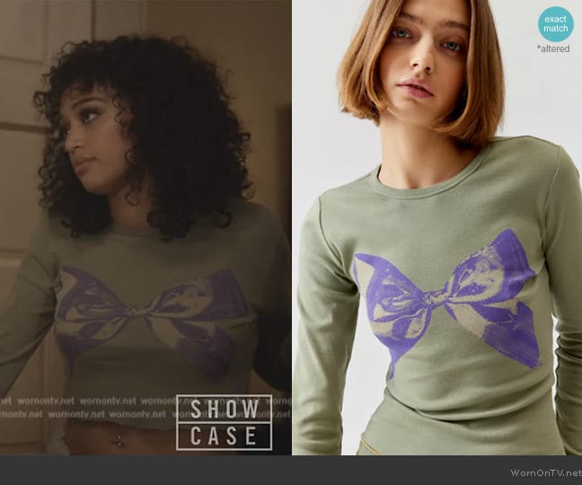 Urban Outfitters Sweet Bow Long Sleeve Baby Tee worn by Olivia Baker (Samantha Logan) on All American