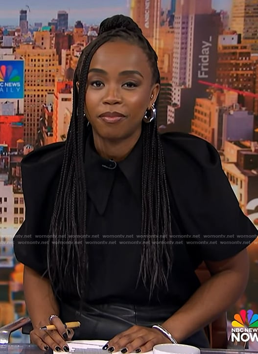 Zinhle's black collared puff sleeve blouse on NBC News Daily