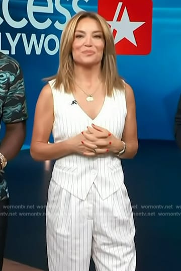 Kit’s white pinstripe vest and pants on Access Hollywood