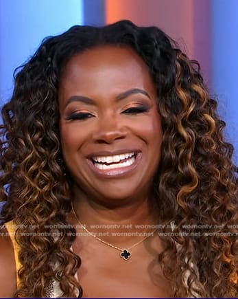 Kandi Burruss’s black and gold clover necklace on Good Morning America