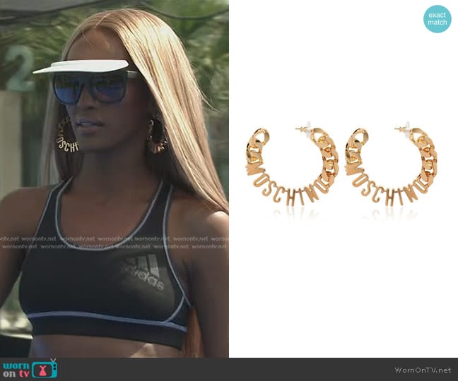 Moschino Logo Lettering Hoop Earrings worn by Chanel Ayan (Chanel Ayan) on The Real Housewives of Dubai