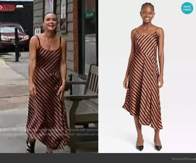 A New Day Asymmetrical Midi Slip Dress in Brown Striped worn by Lindsay Myers on Access Hollywood