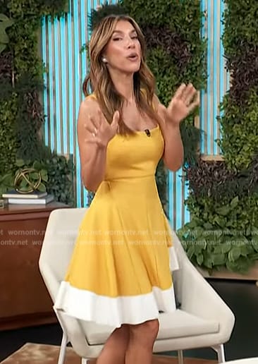 Adrianna Costa’s yellow flare dress on Access Hollywood