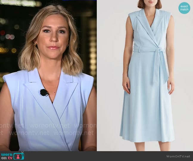 Calvin Klein Belted Peak Lapel Wrap Midi Dress in Breeze worn by Caitlin Huey-Burns on CBS Mornings