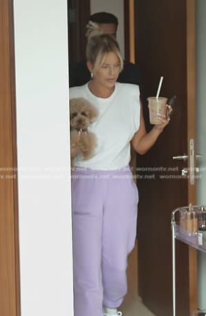 Caroline's white padded shoulder top and lilac track pants on The Real Housewives of Dubai