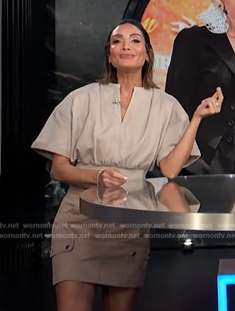 Courtney's khaki crop top and mini skirt on E! News