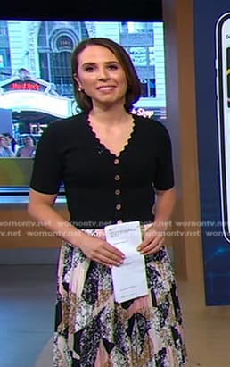 Elizabeth’s black scalloped cardigan and printed skirt on Good Morning America