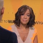 Gayle King’s beige and orange v-neck dress on CBS Mornings