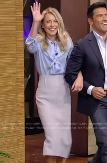 Kelly’s blue tie neck blouse and skirt on Live with Kelly and Mark