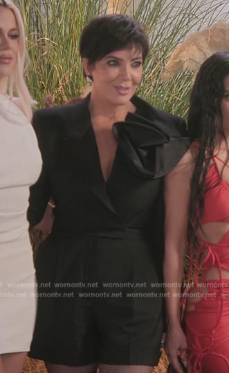 Kris's black floral applique romper on The Kardashians