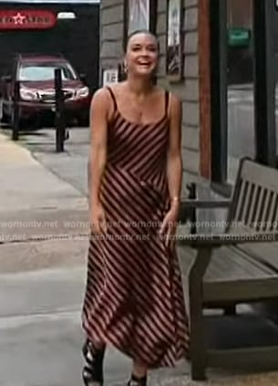 Lindsay Myers' brown stripe dress on Access Hollywood