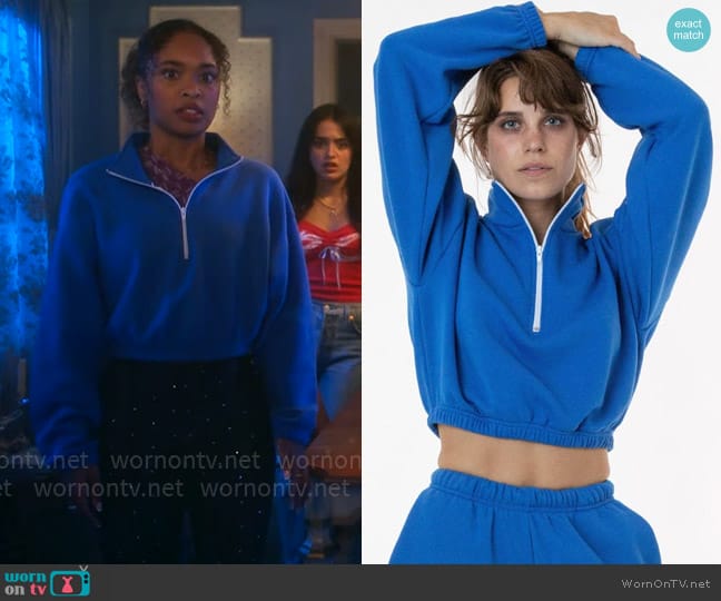 Faran’s blue quarter-zip sweatshirt on Pretty Little Liars Original Sin