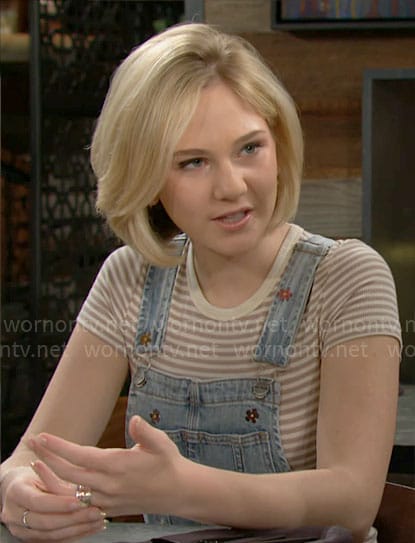 Lucy's floral denim overalls and striped top on The Young and the Restless