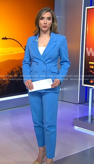 Margaret’s blue double breasted blazer and pant suit on CBS Evening News