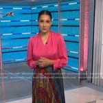 Morgan’s pink blouse and rainbow pleated skirt on NBC News Daily