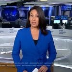 Nancy Cordes’s blue wrap dress on CBS Evening News