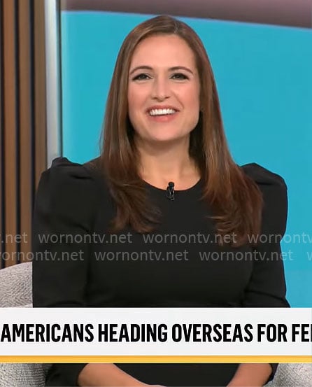 Nikki Battiste's black puff sleeve jumpsuit on CBS Mornings