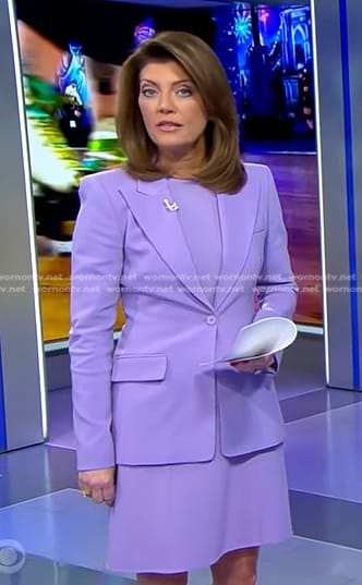 Norah’s lilac dress and blazer on CBS Evening News