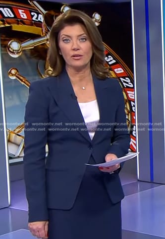 Norah’s navy peak lapel blazer on CBS Evening News