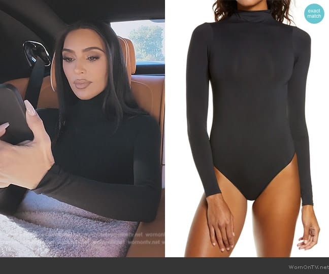 Skims Essential Bodysuits Mock Neck Long Sleeve Bodysuit worn by Kim Kardashian (Kim Kardashian) on The Kardashians