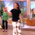 Sunny’s black top and crane print skirt on The View