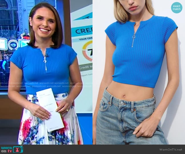 WornOnTV: Elizabeth’s blue ribbed top and floral pleated skirt on Good ...