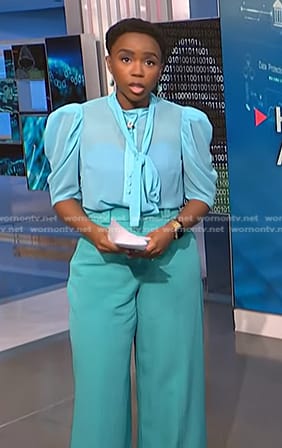 Zinhle’s blue tie neck blouse and wide-leg pants on NBC News Daily