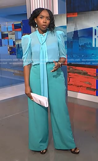 Zinhle’s blue tie neck blouse and wide-leg pants on NBC News Daily