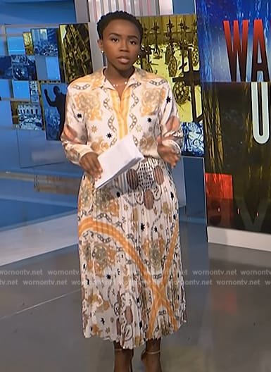 Zinhle’s white print shirt and pleated skirt on NBC News Daily