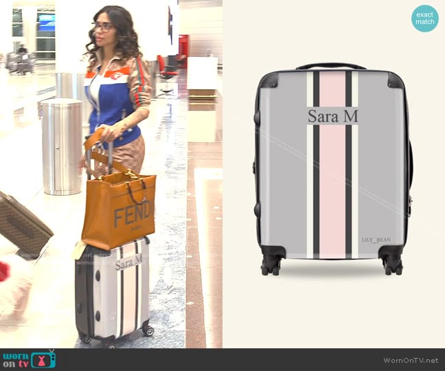 Lily & Bean Personalised French Grey Luggage with White and Pink worn by Sara Al Madani (Sara Al Madani) on The Real Housewives of Dubai