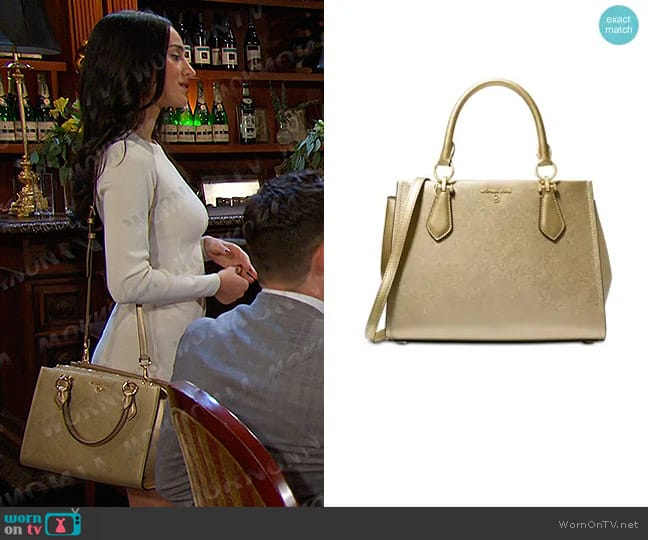 Michael Kors Marilyn Medium Leather Satchel in Pale Gold worn by Gabi Hernandez (Cherie Jimenez) on Days of our Lives