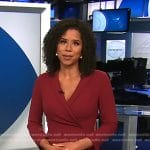 Adriana Diaz’s burgundy surplice sheath dress on CBS Evening News