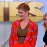 Ashley Alderfer Kaufman’s red floral print blazer and pants on The View