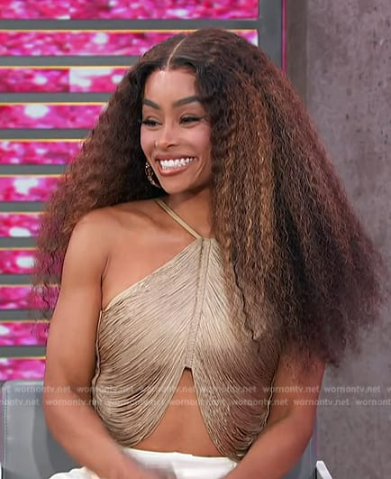 Blac Chyna’s metallic halter top on Access Hollywood