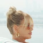 Caroline’s pink sunglasses and hoop earrings on The Real Housewives of Dubai