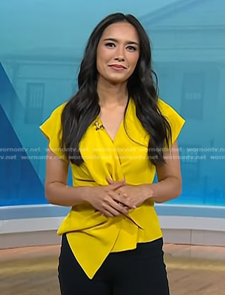 Emilie Ikeda's yellow twist short sleeve top on Today