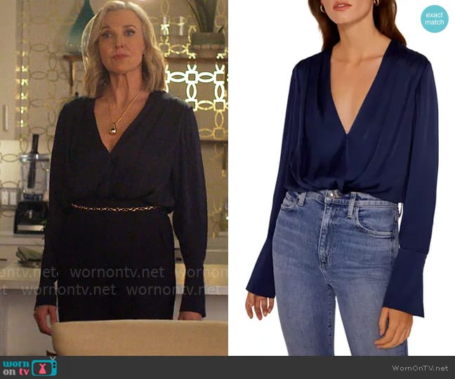 Nadine’s navy blouse on UnPrisoned