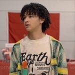 Finn’s Earth graphic tee and plaid cardigan on UnPrisoned