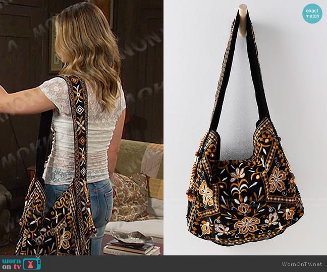 Free People Vic Velvet Slouchy Bag in Moody Midnight worn by Holly Jonas (Ashley Puzemis) on Days of our Lives