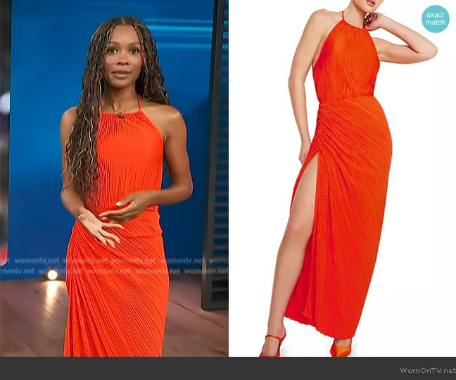 Good American Always Fits Plisse Halter Tank worn by Zuri Hall on Access Hollywood