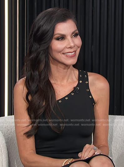 Heather Dubrow's black grommet one shoulder dress on E! News