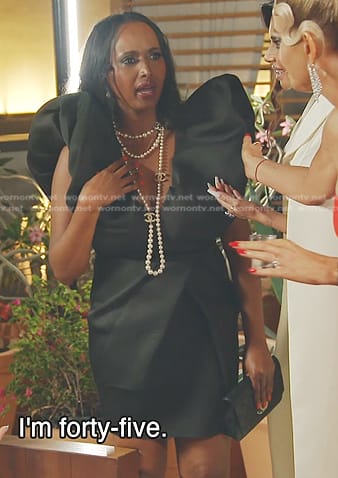 Ifrah's black ruffle v-neck dress on The Real Housewives of Dubai