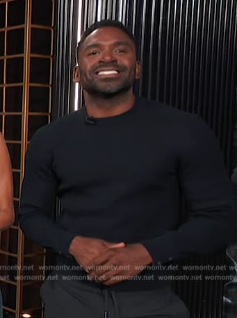 Justin's black button cuff sweater on E! News