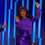 Keke Palmer’s purple tie blouse and sequin skirt on Password