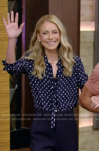 Kelly’s blue polka dot tie neck blouse on Live with Kelly and Mark