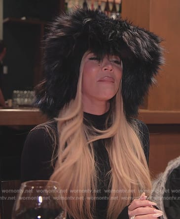 Khloe's black turtleneck top on The Kardashians