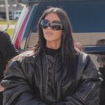 Kim’s black leather oversized jacket on The Kardashians