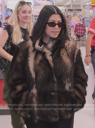 Kourtney's brown fur jacket on The Kardashians